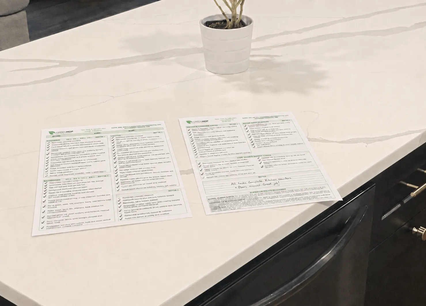 A completed Green Mop cleaning checklist left on a kitchen counter, tasks ticked off and a handwritten note at the bottom