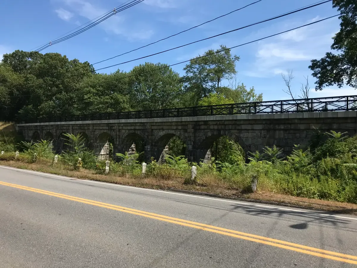 The stone 8 Arch Bridge carrying the Upper Charles Rail Trail in Holliston