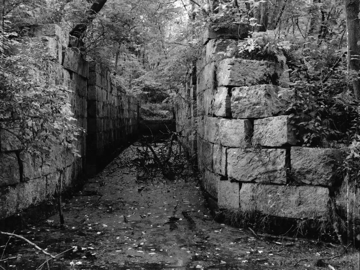 The cut stone chamber of the historic Millville Lock on the Blackstone Canal